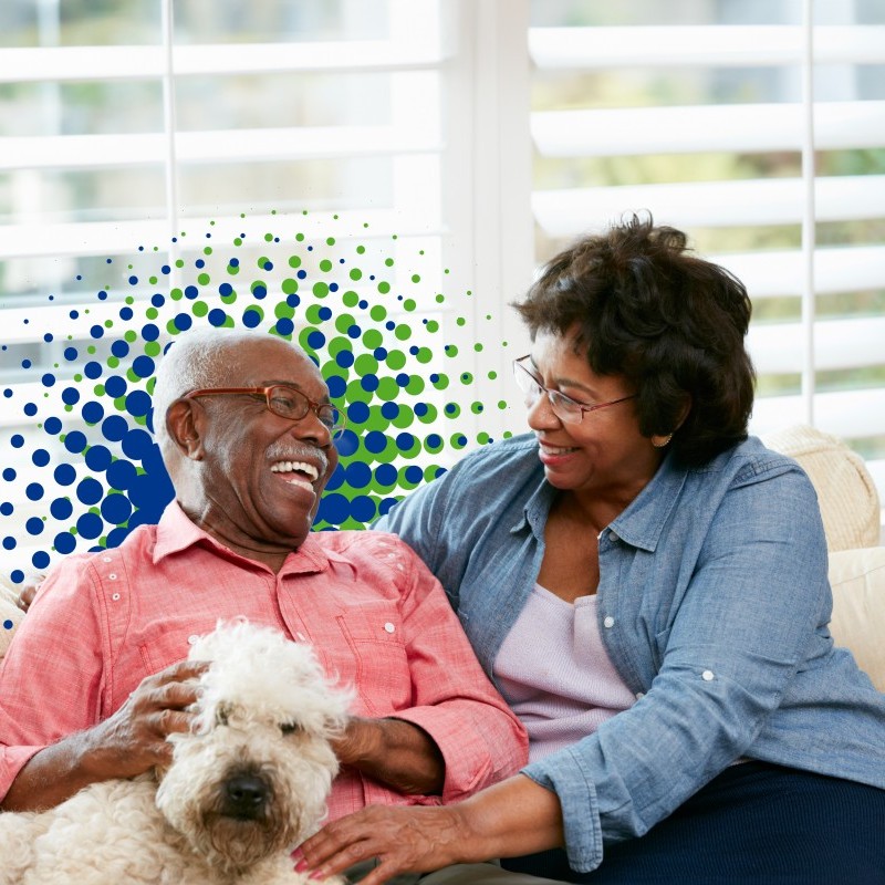 Couple Laughing with Dog