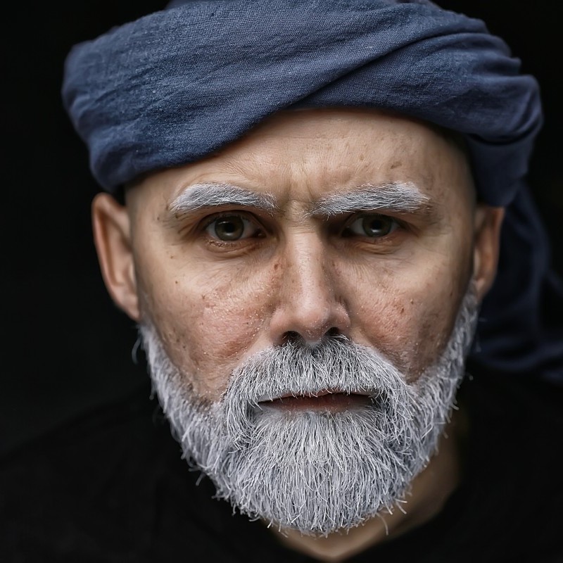 Man with White Eyebrows and Beard